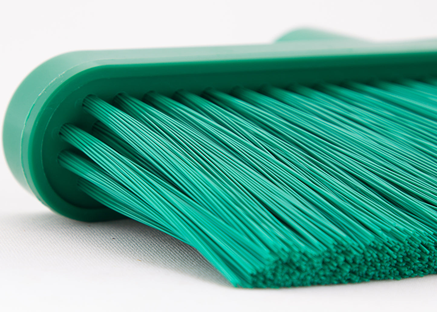Close up of angled telescopic broom head