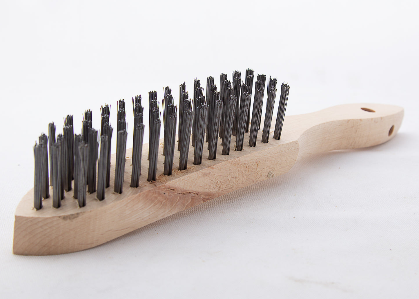 Close up photo of our 4 row wore scratch brush