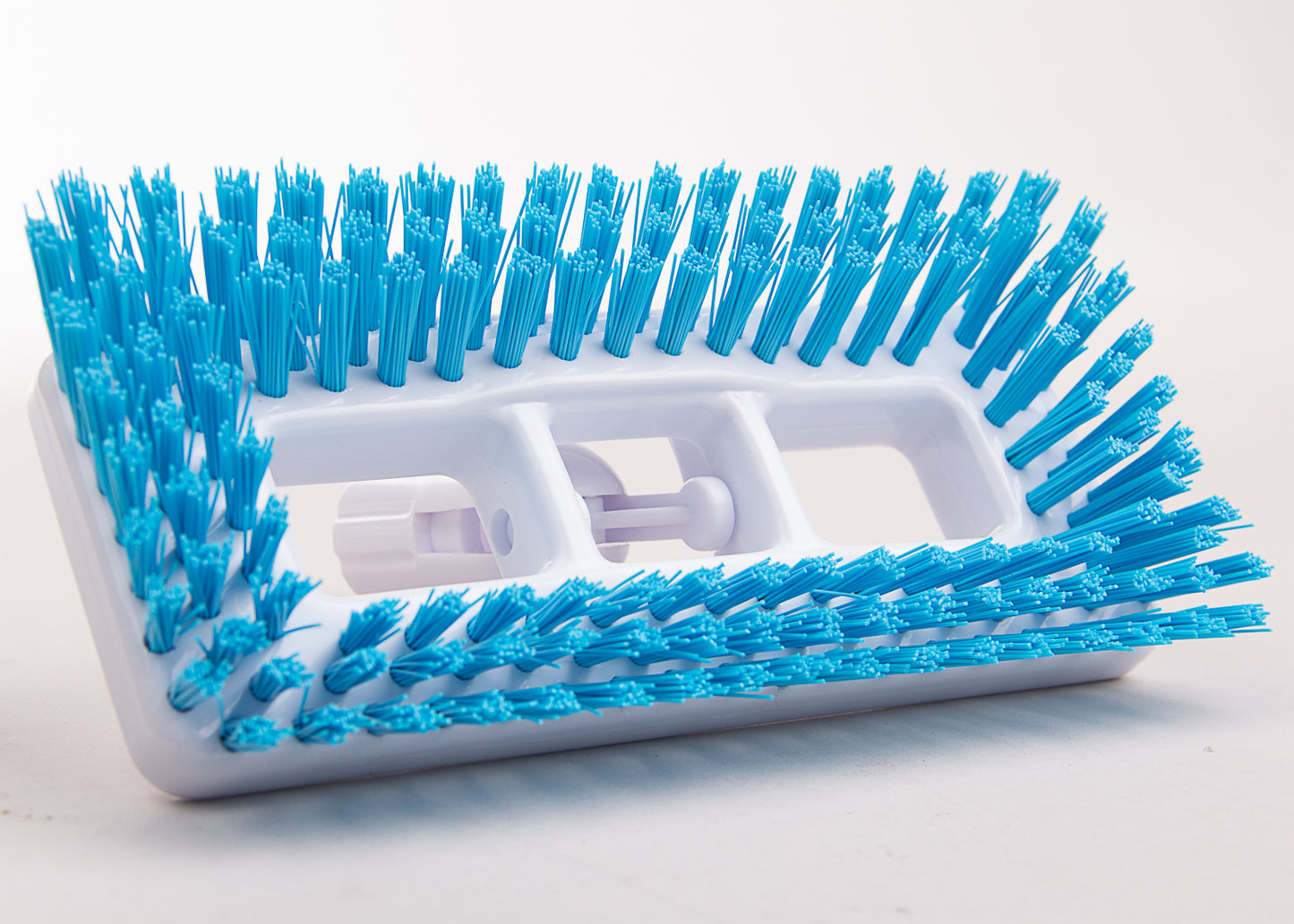 photo showing the stiff bristles of our swivel head broom head