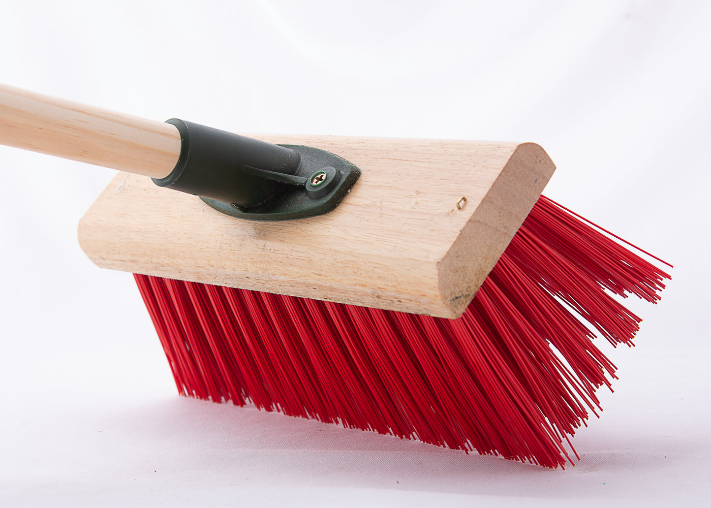 very stiff bristles on our outdoor broom head with threaded handle