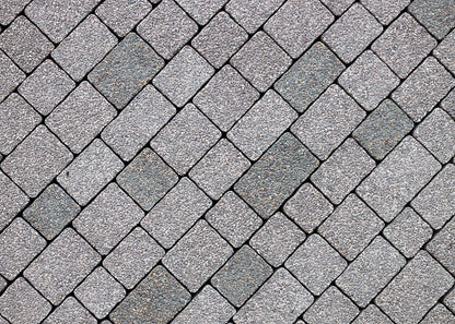 photo showing driveway blocks that are clean and free from greening and moss growth. Batifast can be used to clean surfaces and remove moss and lichen.