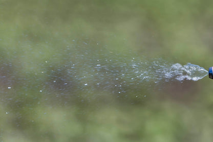 liquid being sprayed showing the spray pattern indicator